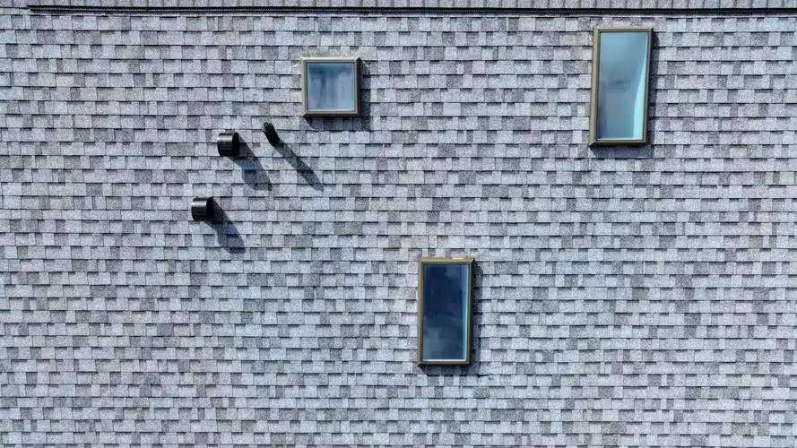 Aerial view of a commercial buildingโs metal roofing system in Melbourne Beach, designed for hurricane resistance
